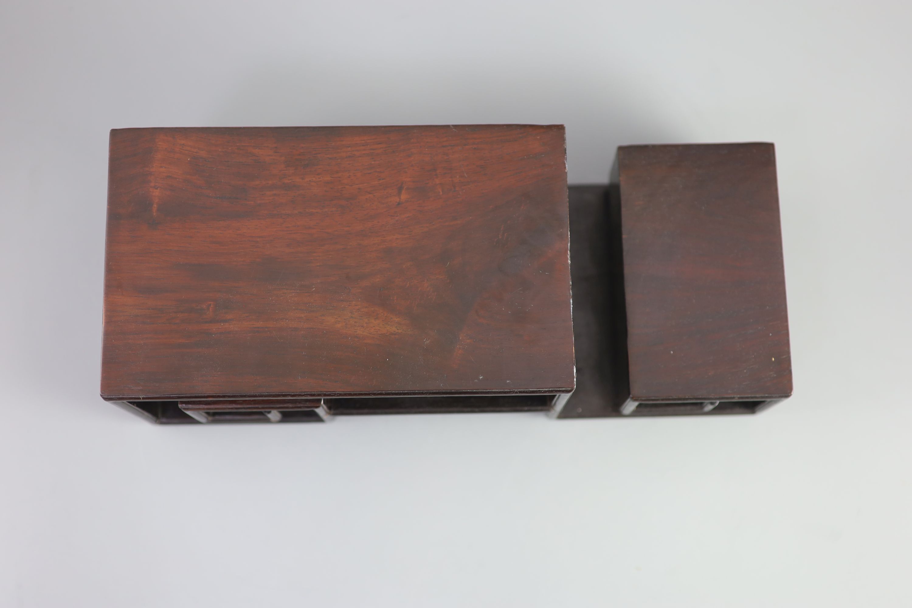 A Chinese hongmu scholar’s stand, 19 century, 34 cm wide
